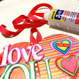 Clear_scraps_love-you_more_script_word_valentine_bow