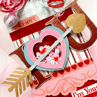 Clear_scraps_valentine_tag_altered_chipboard_embellishment_heart_shaker_tsanders_cu